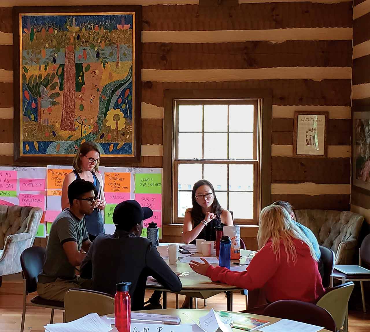 Students talking during workshop at retreat
