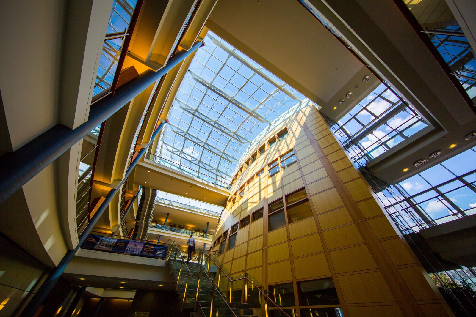 The staircase and skylight of the Rafik B. Hariri Building interior, as seen from below