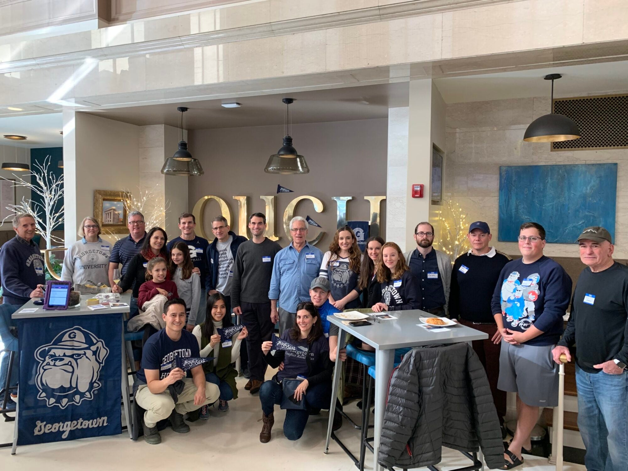 alumni posing at an event