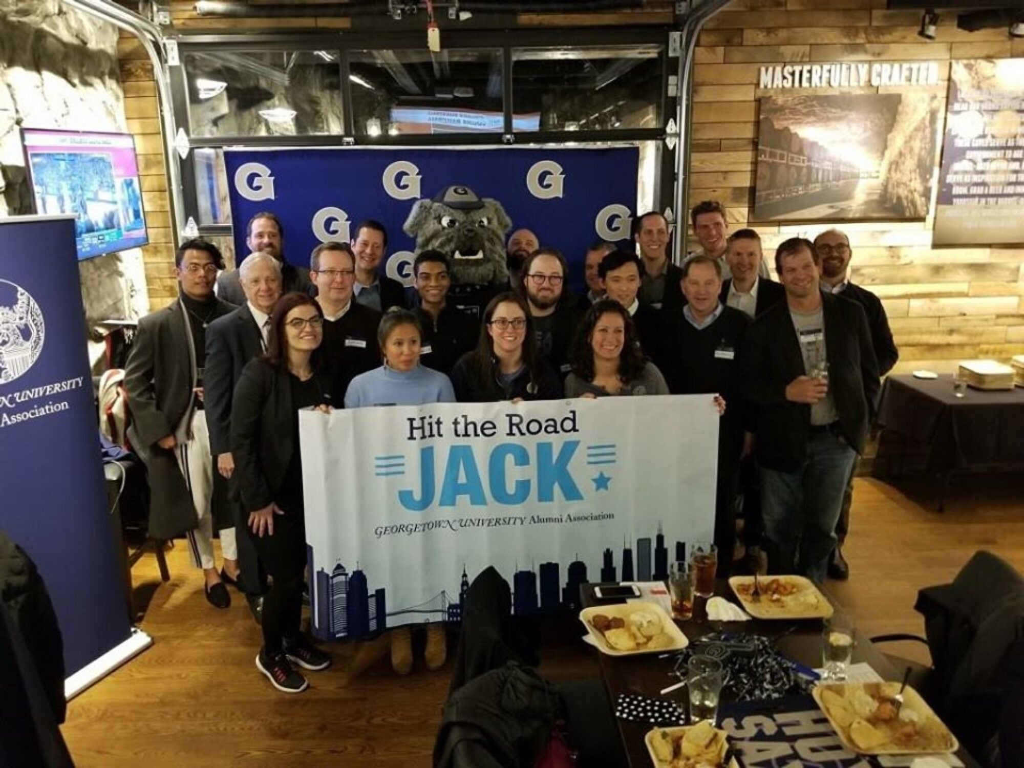 alumni posing at it the road jack event