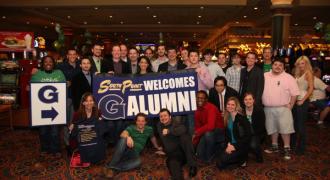 alumni at club event