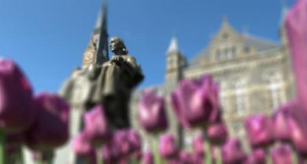 john carroll statue with tulips
