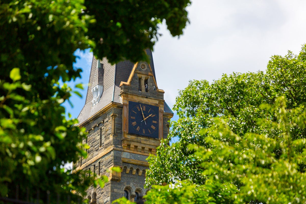 healy clock tower with trees