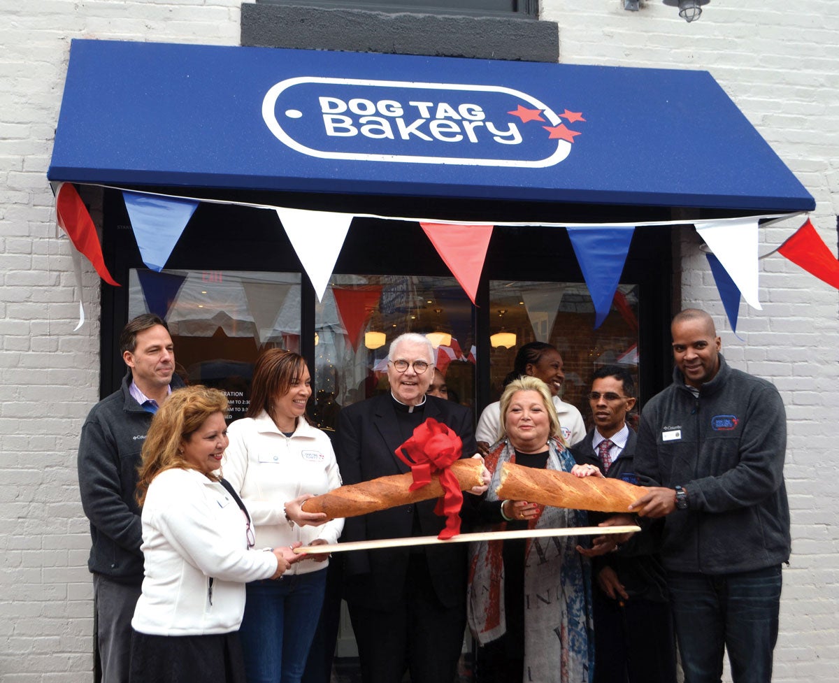 father curry in front of the bakery