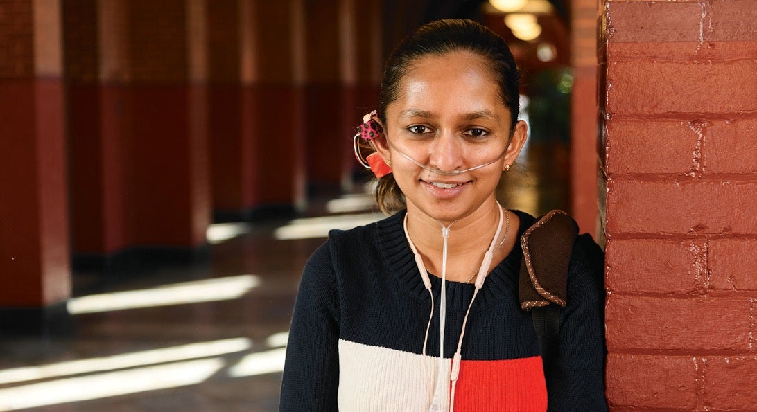 Shavini Fernando (G’18) wears a first-level prototype of OxiWear, her invention to alert users with pulmonary hypertension when their oxygen levels drop critically low. Fernando has the condition herself.