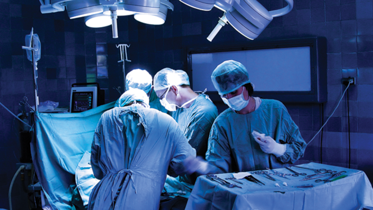 surgeons working in the surgical room