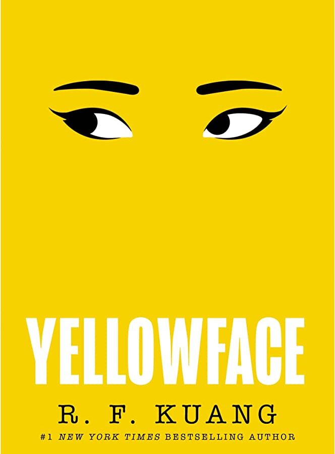 a yellow background with a pair of eyes and eyebrows