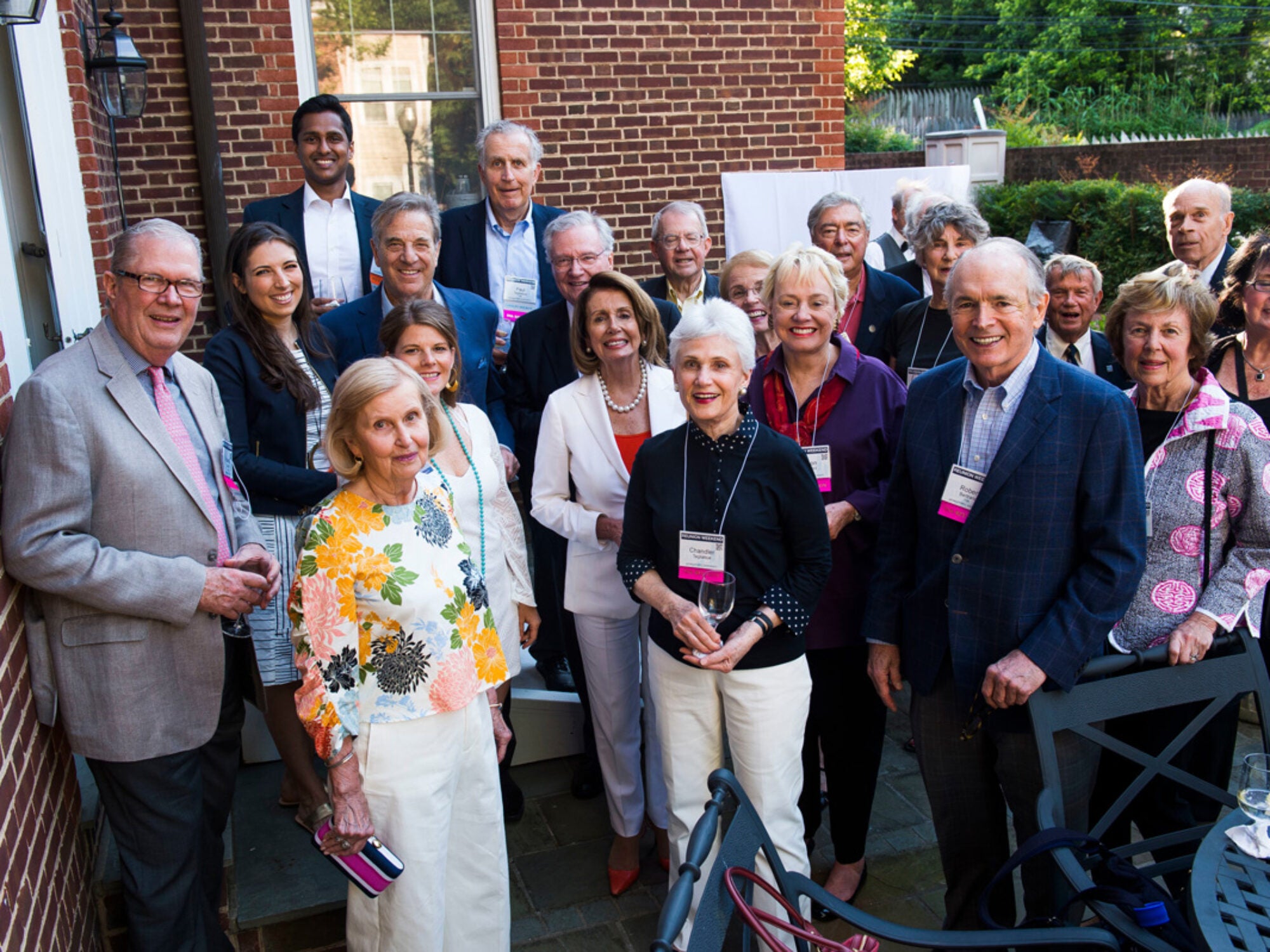 magis society people posing together