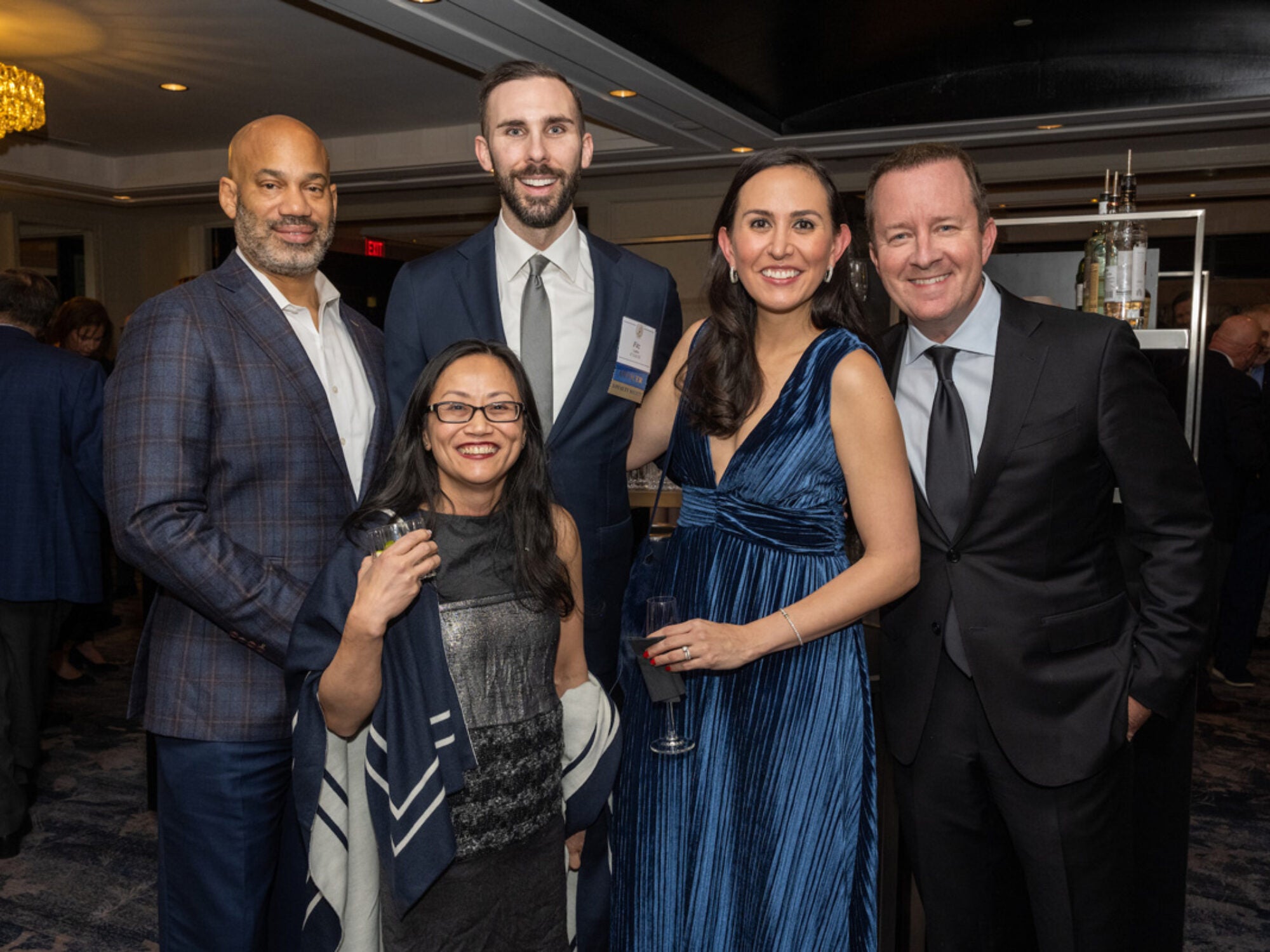 alumni posing at gala