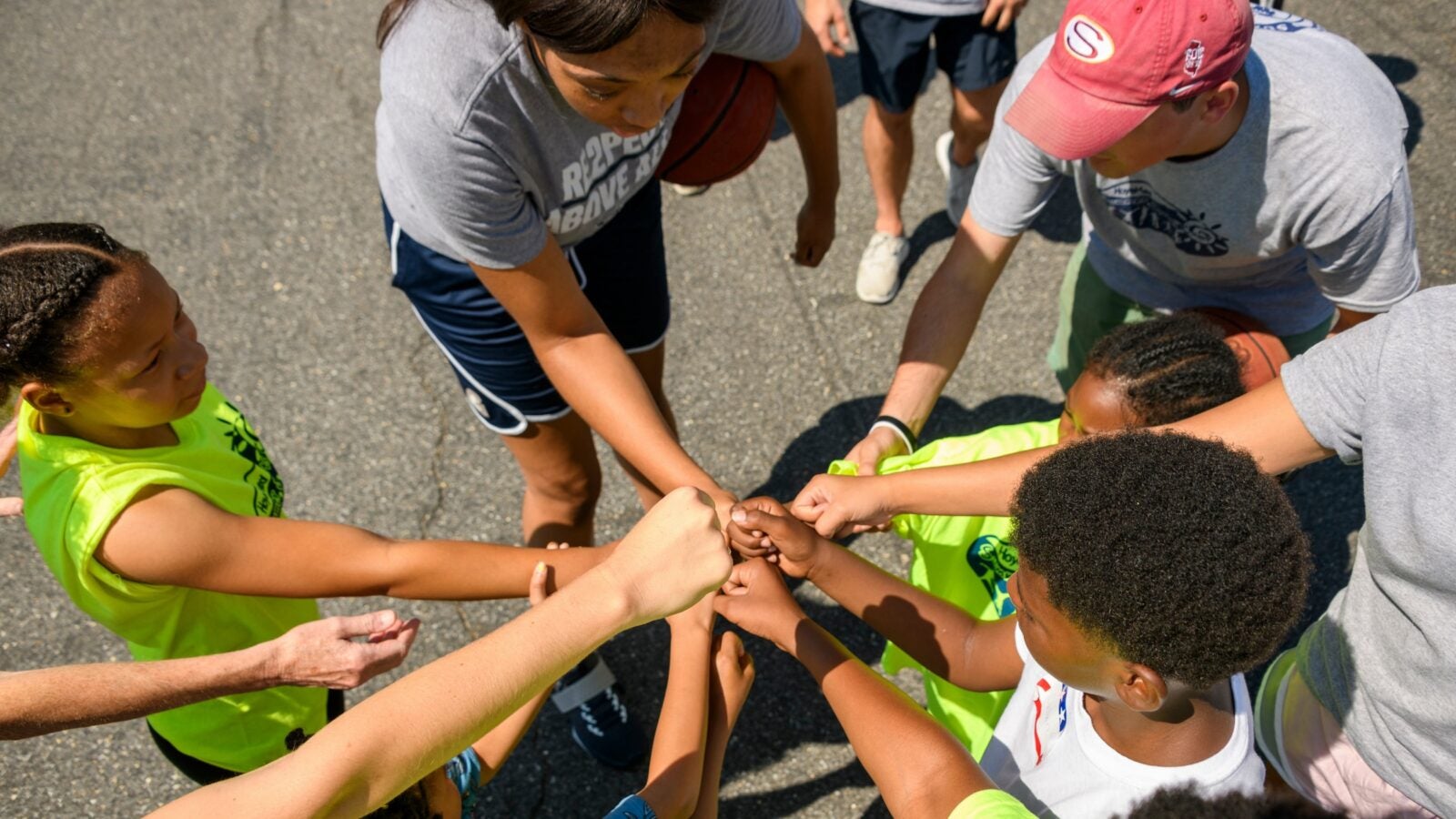 kids with hands in the middle