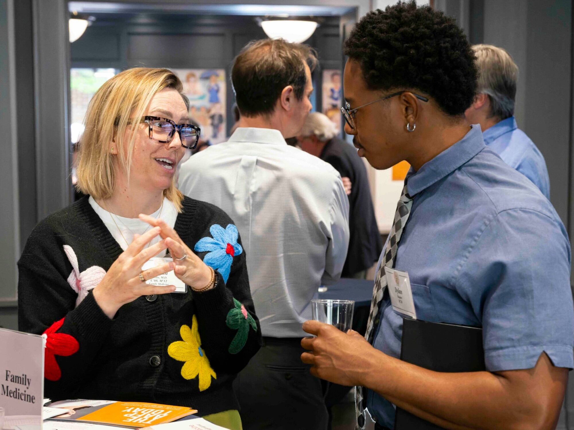 student talking with doctor