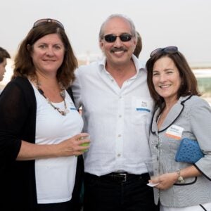 tom raffa posing with people