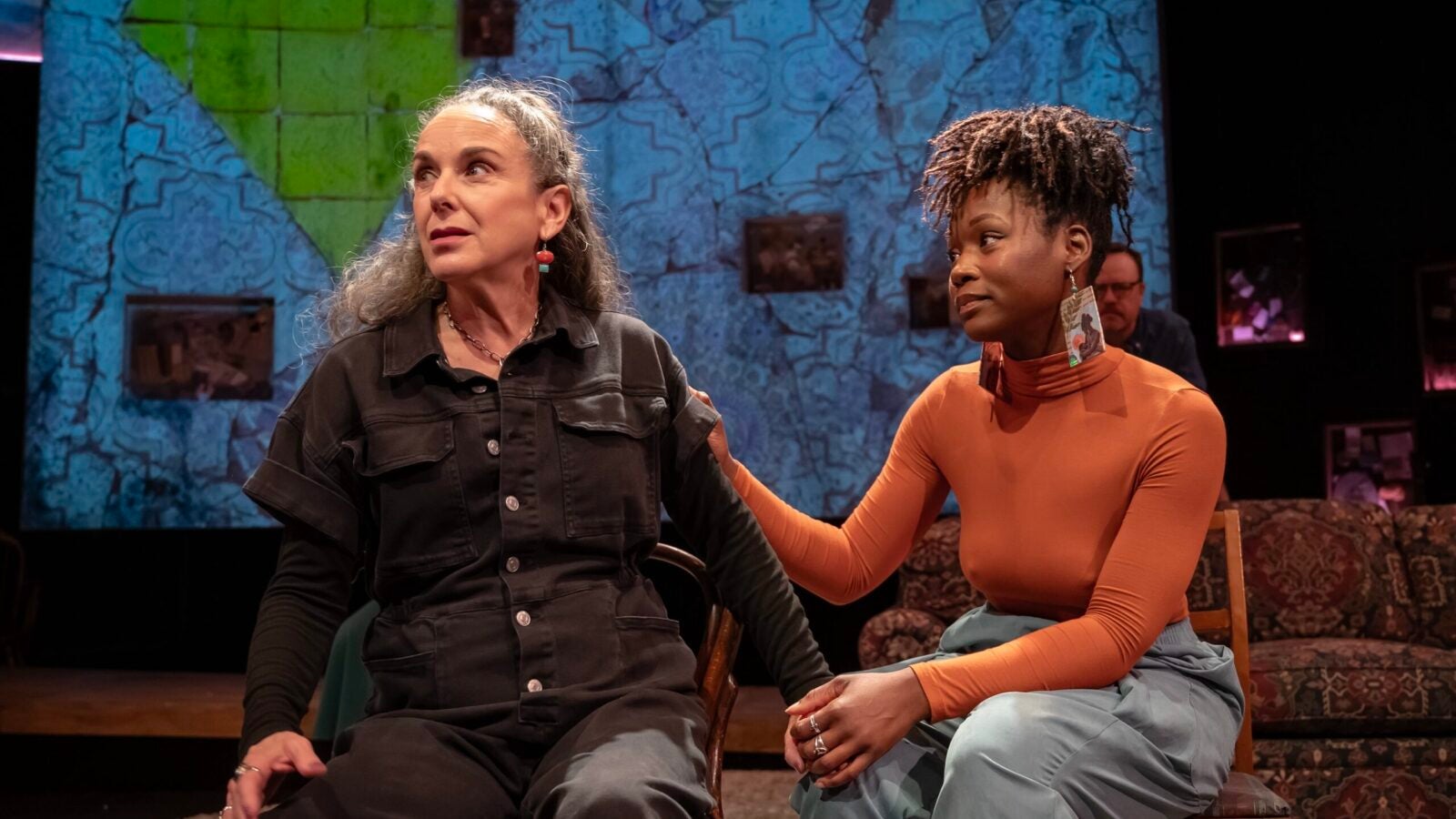 two people on a stage in a play