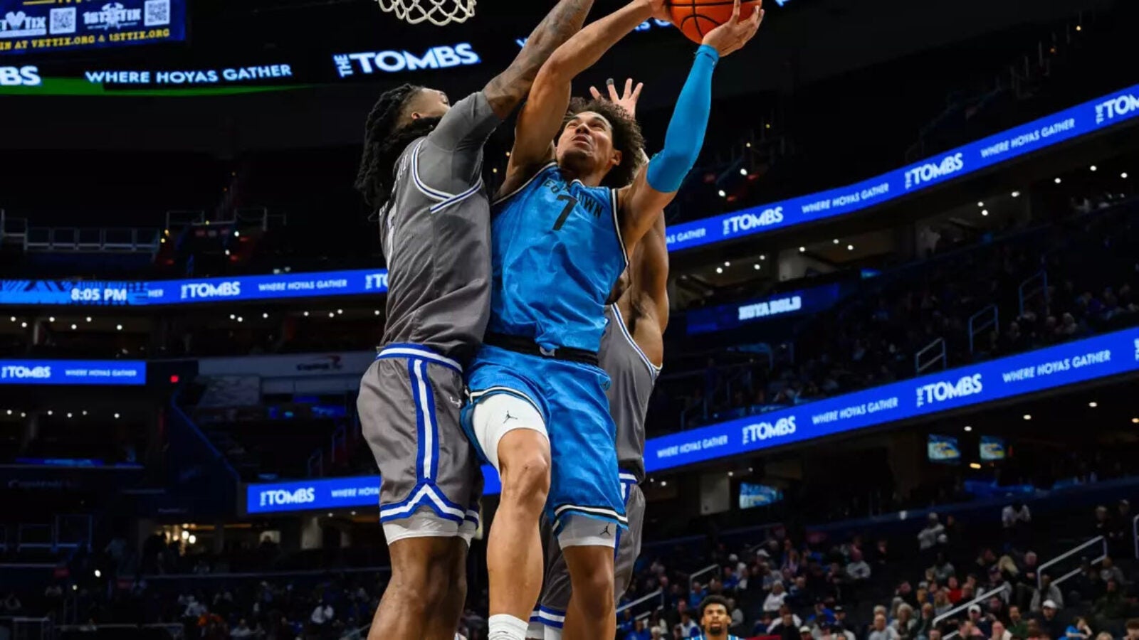 basketball players jumping
