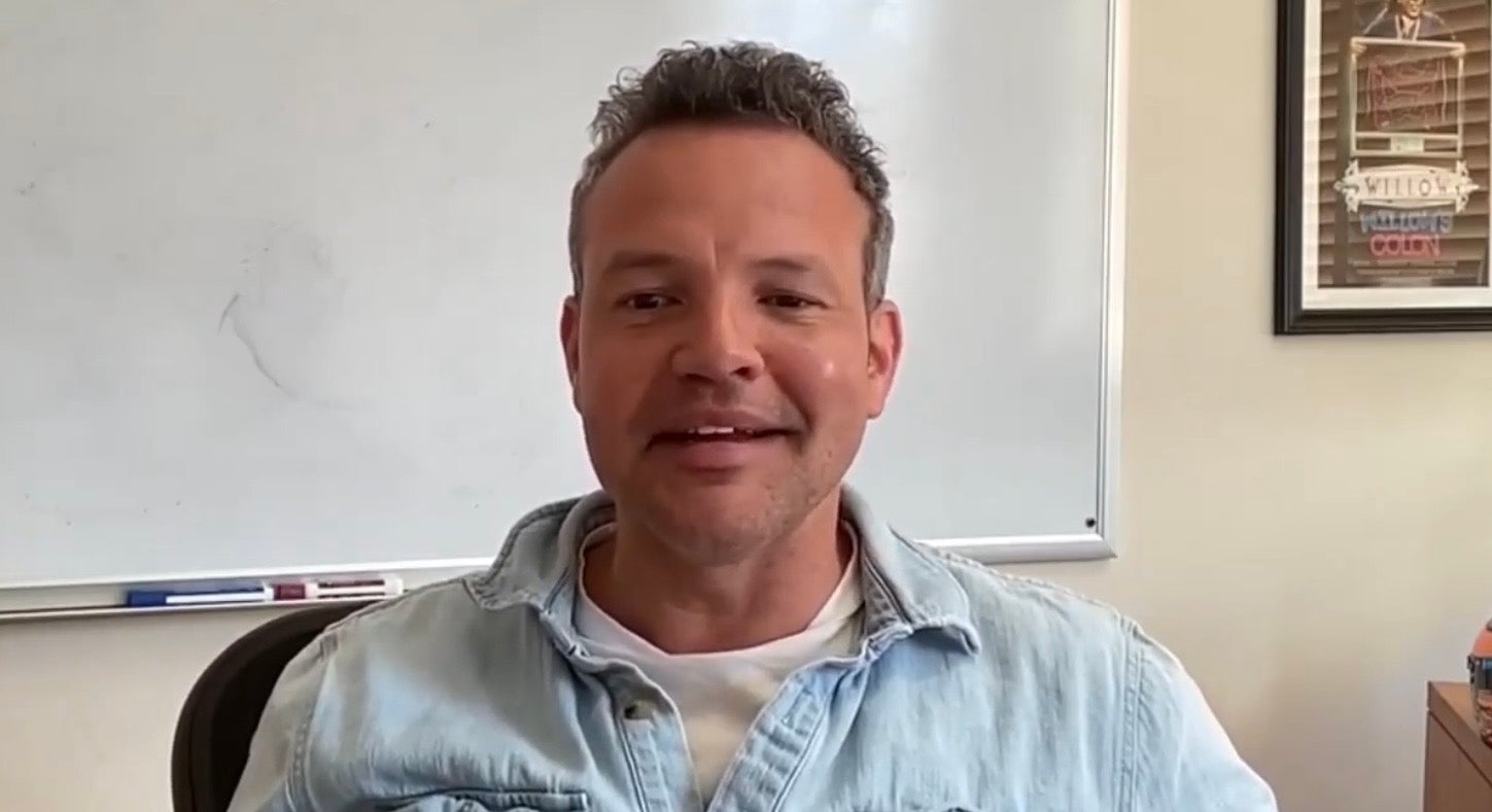 A photo of Adam Countee (C'03), screenshotted from the YouTube video.