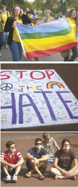 students carrying lgbtq flag and protesting