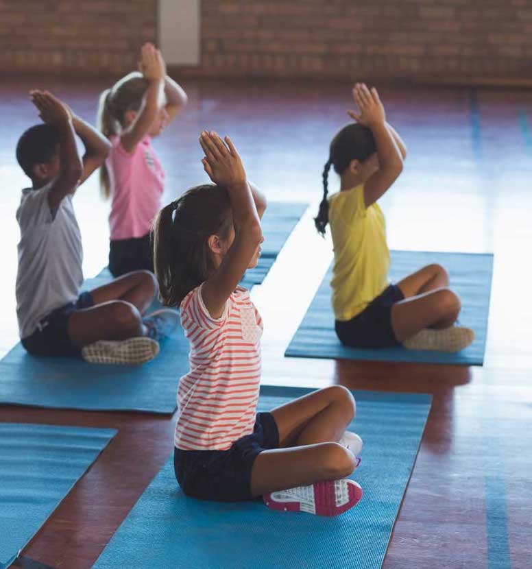 Kids doing yoga