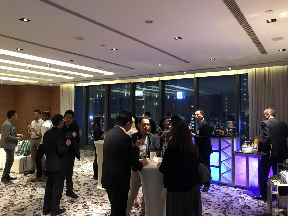 Guests mingle during the alumni  event hosted in Taipei.