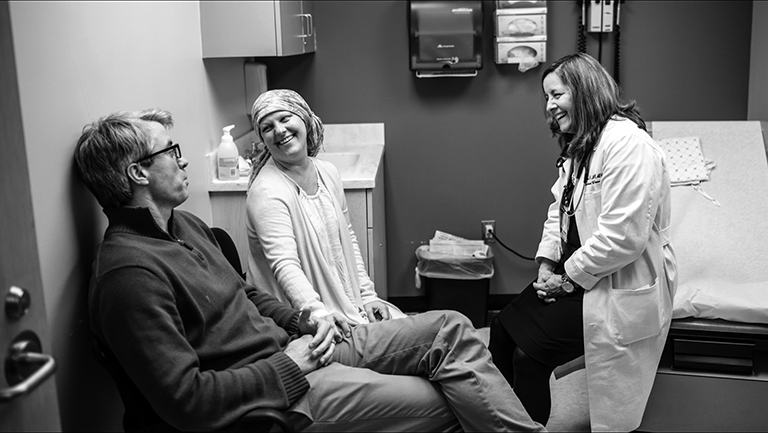 photo of Conor and Susan Miller with Susan Moreland, DNP
